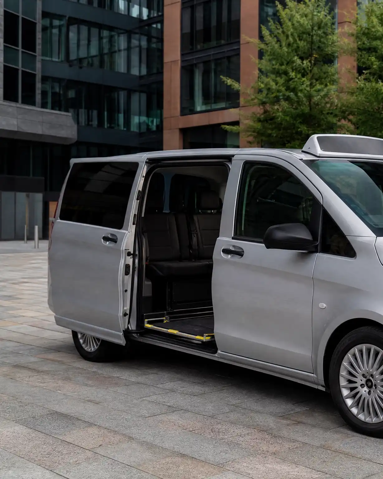 Wheelchair accessible vehicle with ramp deployed